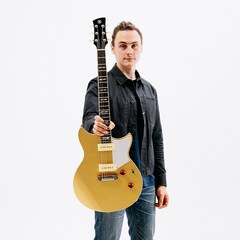 Chris Buck proudly showcasing his Signature Revstar RS02CB