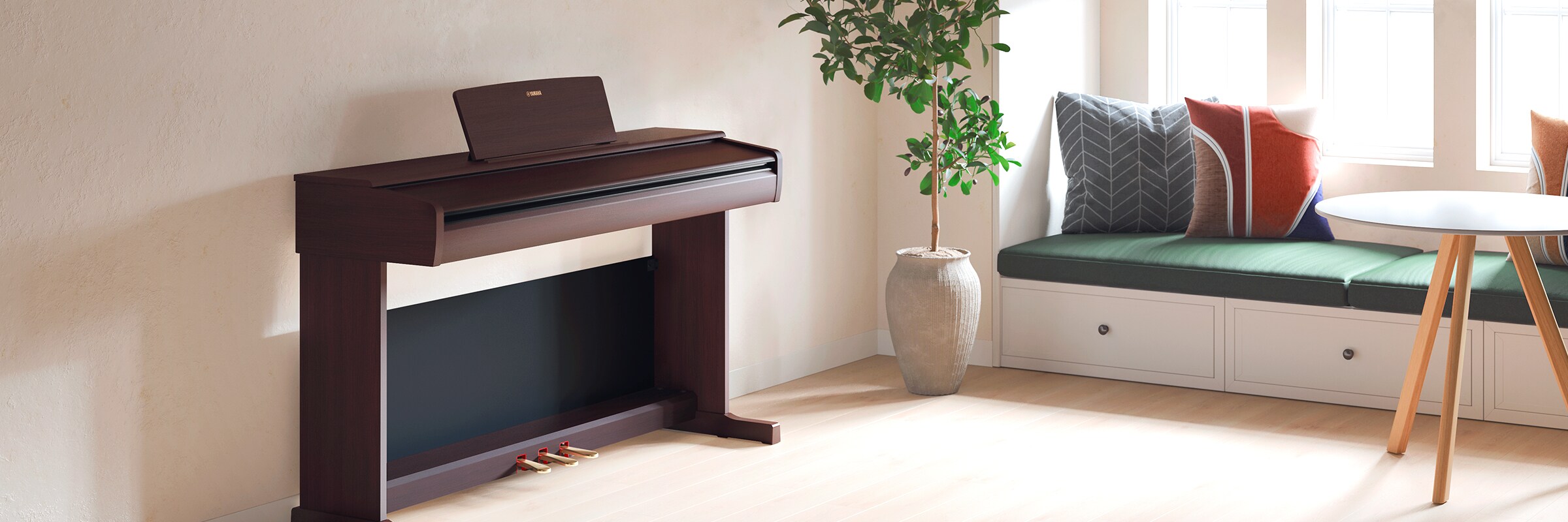 An ARIUS piano in a living room with the lid closed, blending in with the interior